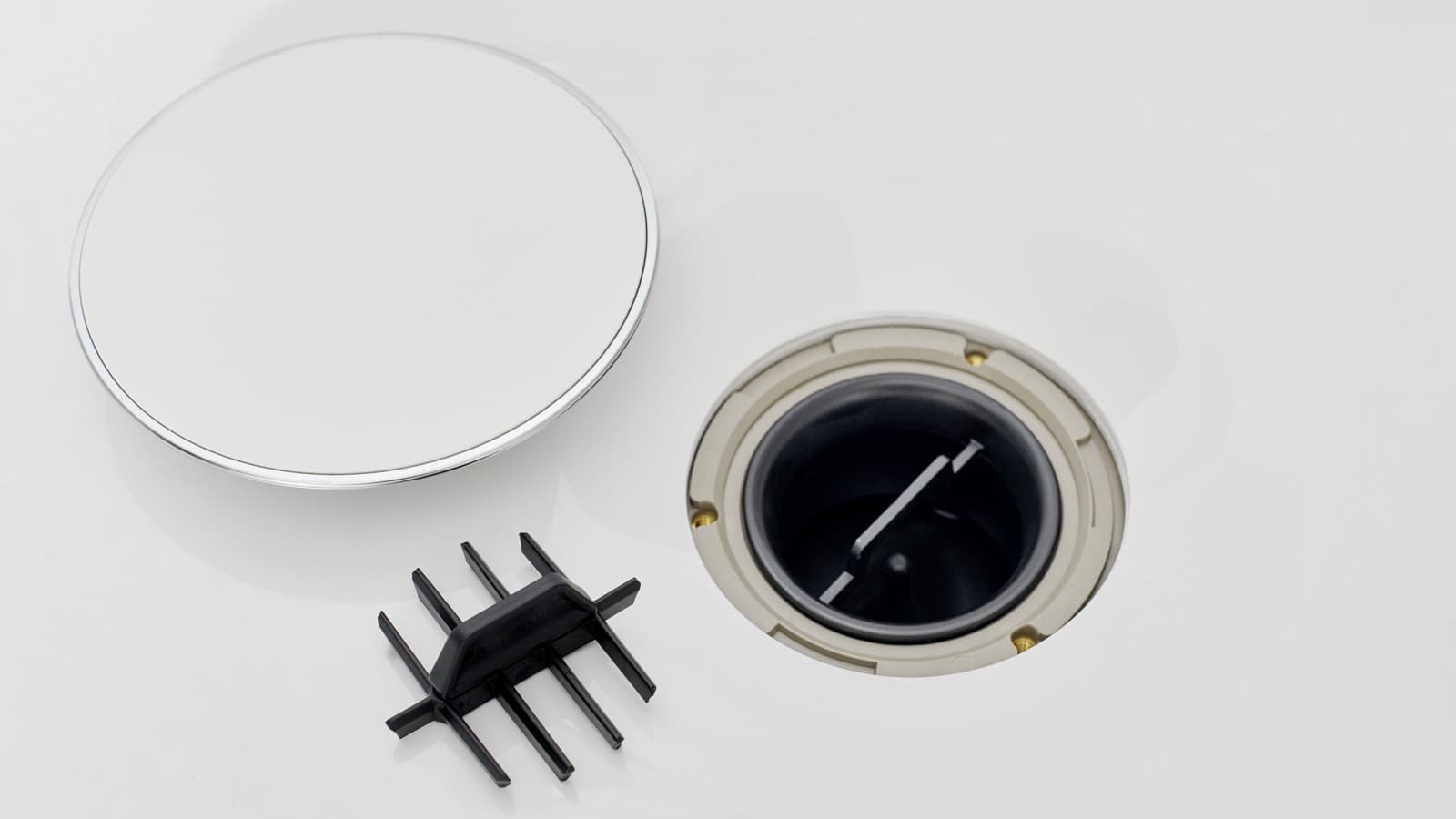 Noteces vāciņš un ķemmveida ieliktnis Noteces vāciņš un ķemmveida ieliktnis