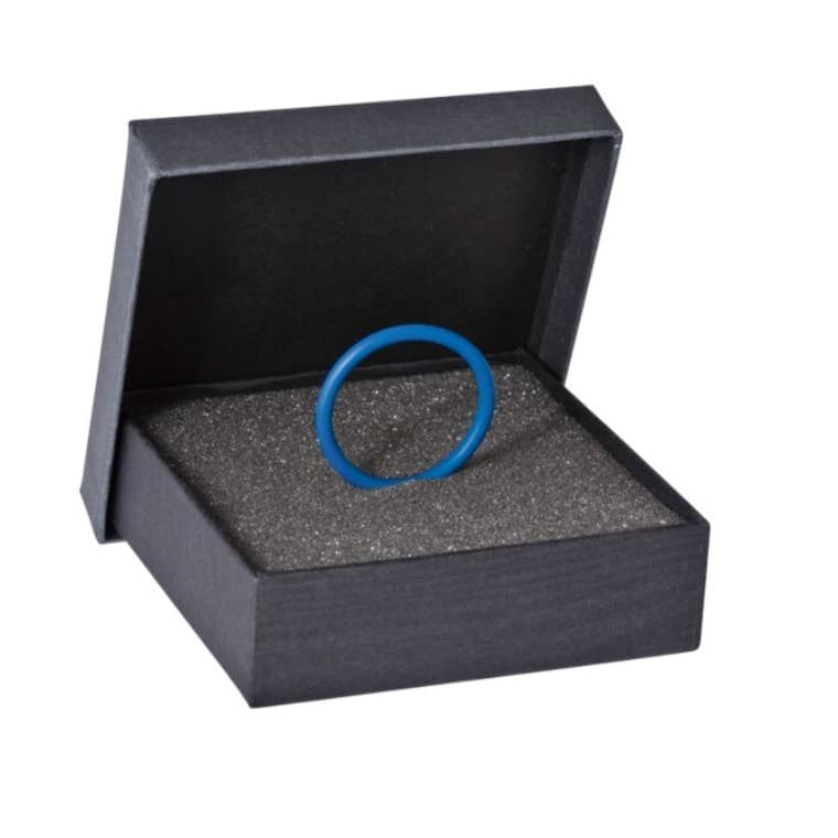 Zils blīvgredzens kastē Zils blīvgredzens kastē